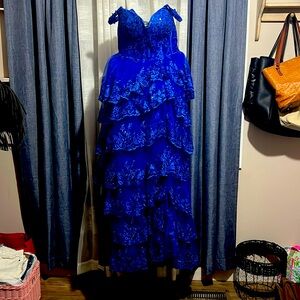 Blue prom dress has lease and sequins size 6 worn one time